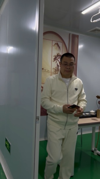 A staff member in the factory production area